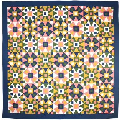 Geometric quilt with star motifs in pink, green, navy from Art East Quilting Co Propeller Quilt Pattern