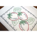 Embroidered strawberry design on Aunt Martha’s Fruit Tea Towels with scalloped border