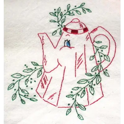 Red embroidered teapot surrounded by green leaves from Aunt Martha’s animated crockery