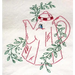 Red embroidered teapot surrounded by green leaves from Aunt Martha’s animated crockery