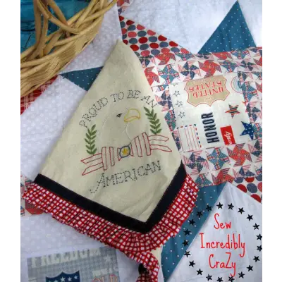 Patriotic embroidered fabric featuring Proud to be American from Aunt Martha’s quilting collection