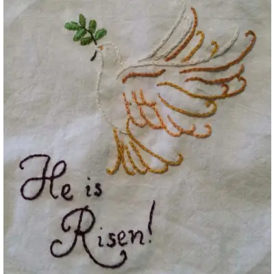 Embroidered dove with He is Risen text and leaf design from Aunt Martha’s Christian Blessings