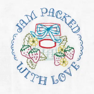 Hand-embroidered Aunt Martha’s design featuring jam jar, bow, strawberries, and love text