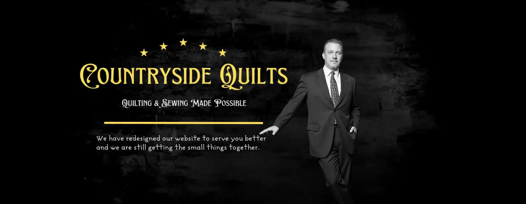 A black and white promotional banner for ’Countryside Quilts’ featuring a person in a suit with yellow text and stars.